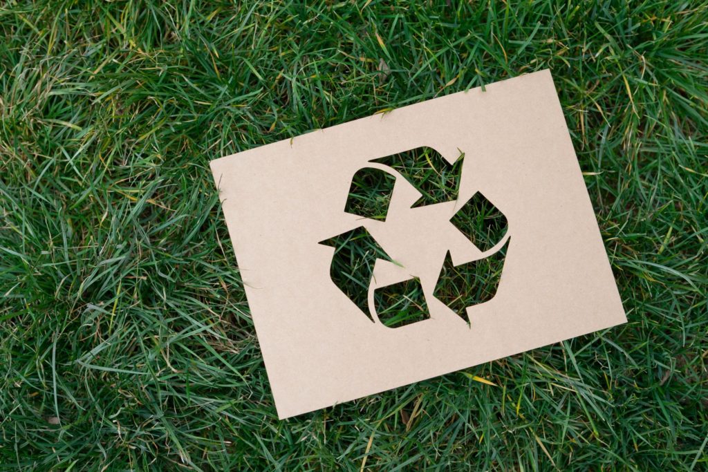 recycle symbol in the grass